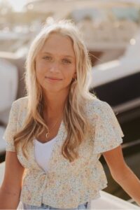 Blonde woman in floral blouse